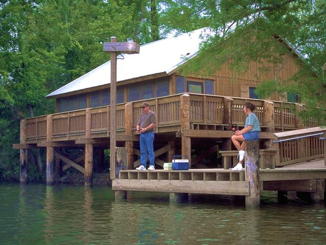 Fishing from one of the lakefront cabins at Lake Fausse Pointe State Park. Photo 2