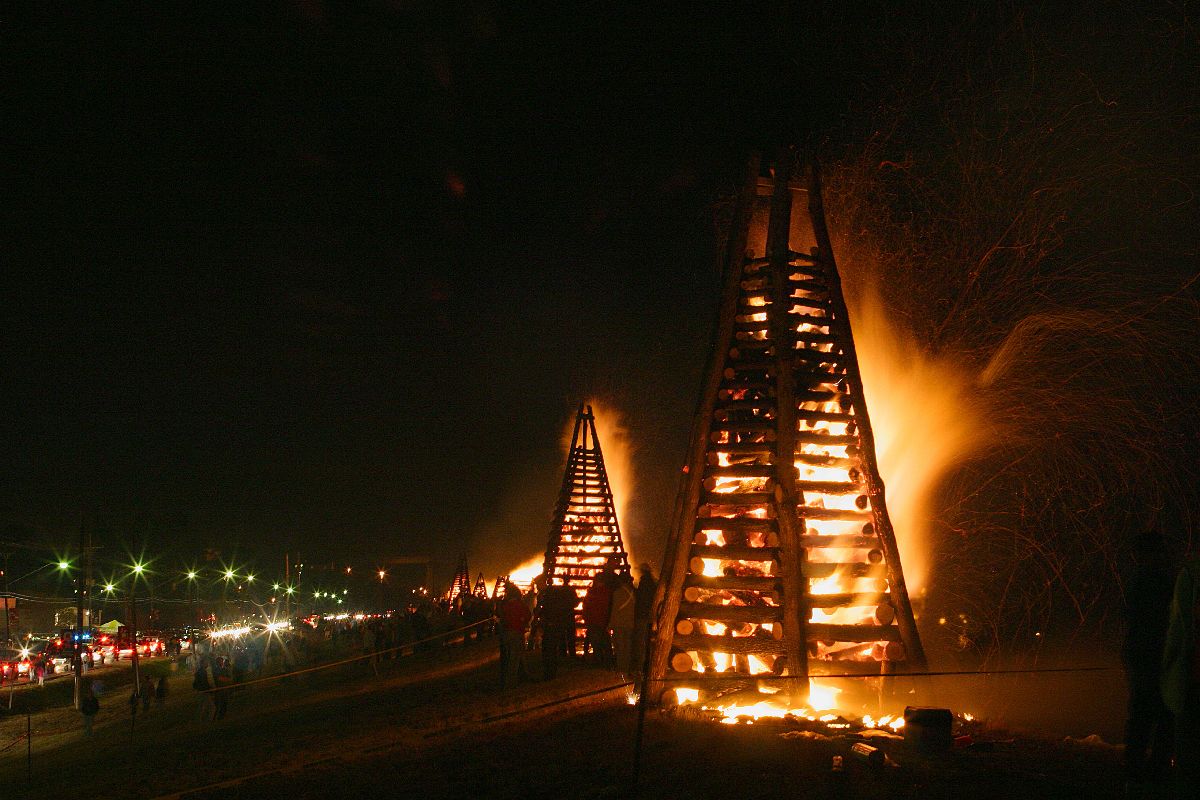 A large wooden structure set on fire during the Louisiana tradition Bonfires on the Levee.