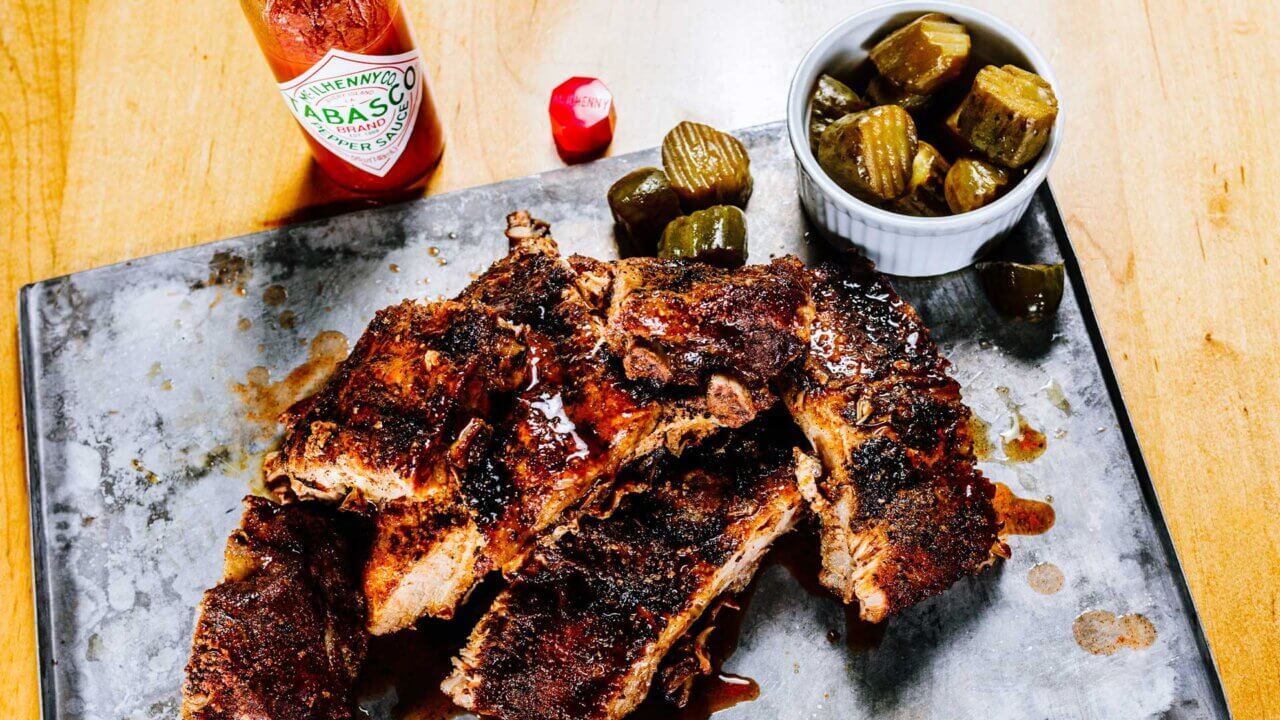 BEER AND HOT SAUCE-BRAISED PORK RIBS AND DOUBLE-DILL PICKLES