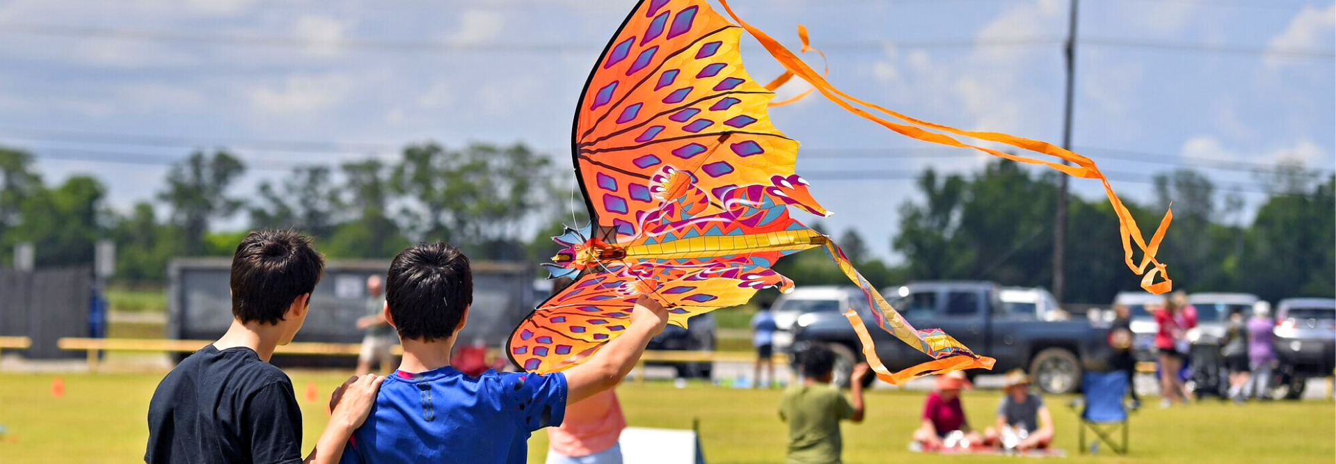 A boy holds a kite at Kite Fest Louisiane.