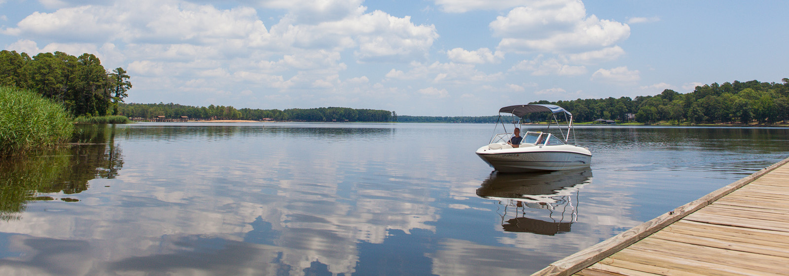 A boat on Cypress Black Bayou.