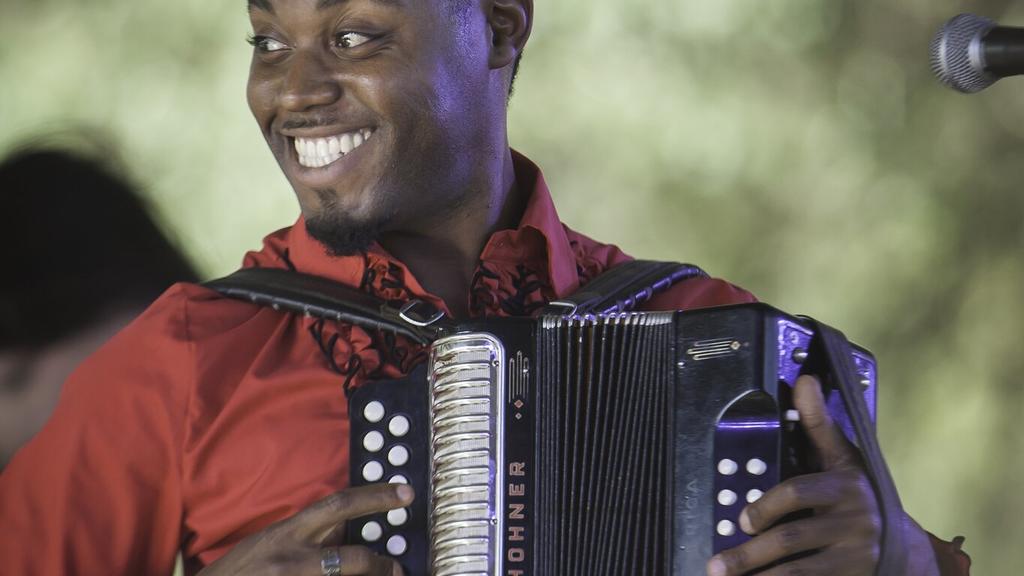 Cedric Watson playing accordion