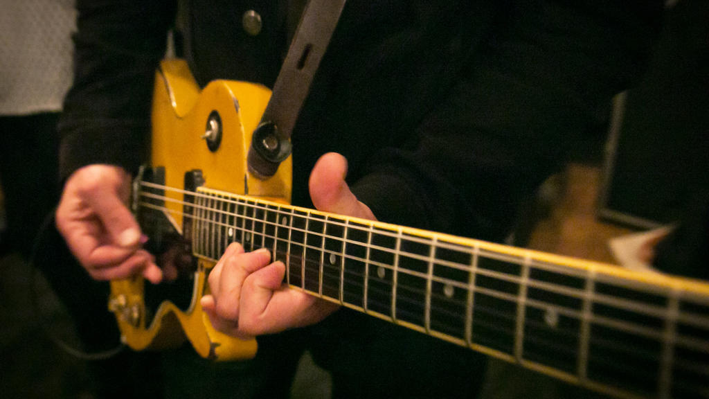 A musician plays rock 'n' roll.