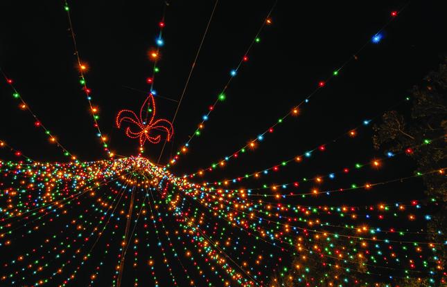 A large Christmas display with colorful lights during a Natchitoches Christmas event.