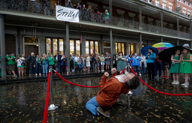At the Tennessee Williams &amp; New Orleans Literary Festival, a person performs an iconic scene from A Streetcar Named Desire.