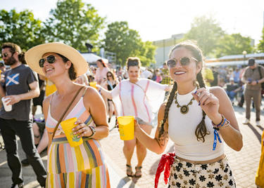 Three women dancing at Festival International.