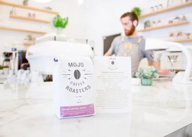 A peek behind the all-white Lighthouse Coffee bar.