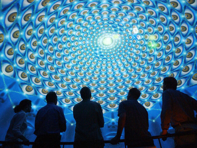 Watching a planetarium show.