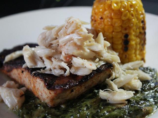 Grilled Amberjack set on Spinach Rockefeller with grilled corn on the cob