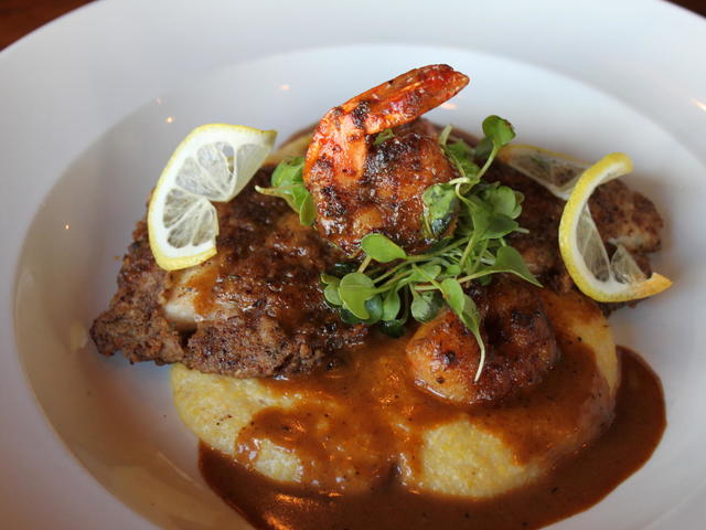 Drum Fish over Stone-Ground Grits with BBQ sauce and Grilled Shrimp