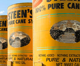 A huge yellow-orange container of Steen's Cane Syrup in Abbeville, Louisiana.