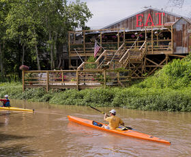 Bayou Teche Paddlers pass The Little Big Cup. Credit: St. Landry Parish Tourist Commission