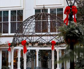 The Ritz-Carlton courtyard, decked with red Christmas bows.