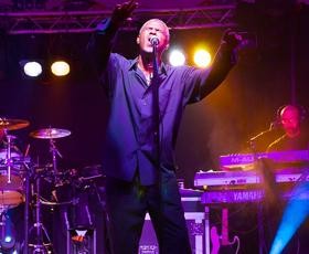 Man performs a song at Evangeline Downs Racetrack &amp; Casino.