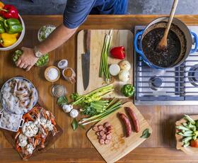 Chef preparing Seafood Gumbo