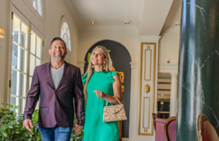 A couple walks through the lobby of the Bourbon Orleans Hotel in New Orleans.