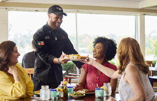 Guests enjoy a meal at Orlandeaux's Cafe.