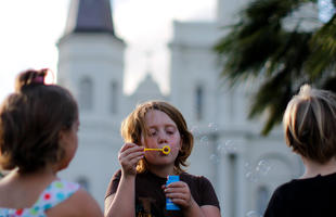 Kids playing at Jackson Square in New Orleans.